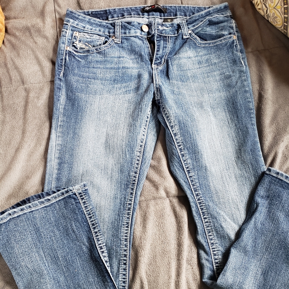 Distressed blue jeans